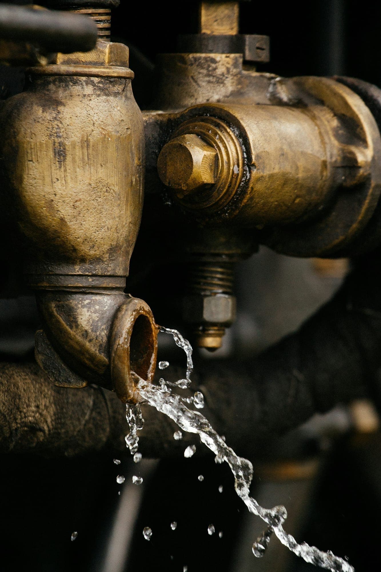 Water droplet on a brass pipe fitting